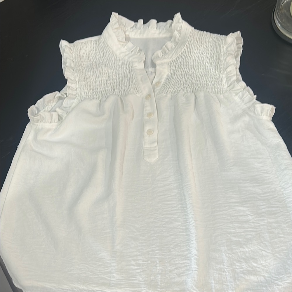 White Ruffled Sleeveless Blouse
